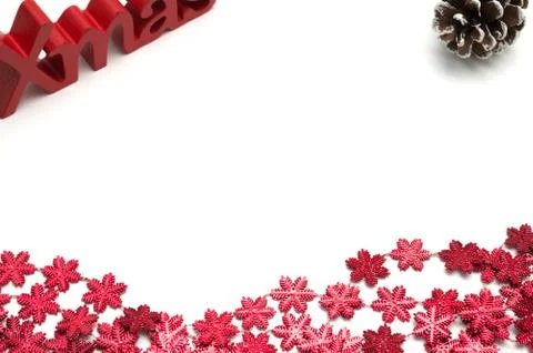 X-mas text and  pine coneon, red snow flower decoration white background Stock Photos
