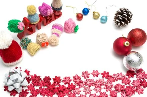 X-mas text and  pine cone, ball, fur hat, ribbon,  red snow flower decoration Stock Photos