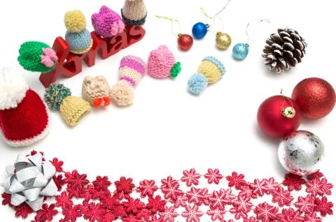 X-mas text and  pine cone, ball, fur hat, ribbon,  red snow flower decoration Stock Photos