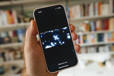 The X new Twitter app on a iPhone smartphone Stock Photos