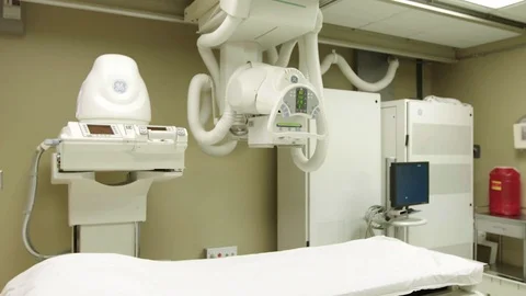 X-ray machine and table in doctor office or hospital Vídeos de archivo 83738737