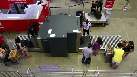 X-Ray security scanner at airport, check passenger baggage, timelapse Stock Footage 55407969