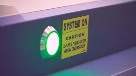 X-ray system is turned on. Baggage is scanned in security scanner. Video stock 82844505