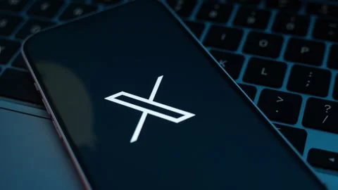 X Social Media App Logo Displayed on Smartphone Stock Footage 343376708