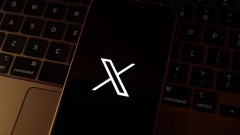X Social Media App Logo Displayed on Smartphone Stock Footage 343376984