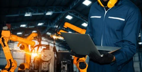 XAI Engineer use advanced robotic software to control industry robot arm in 스톡 사진
