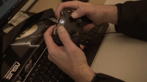 Xbox Controller Hooked Up To Computer Game Developer Coding Unity Engine Game Stock Footage 88016412