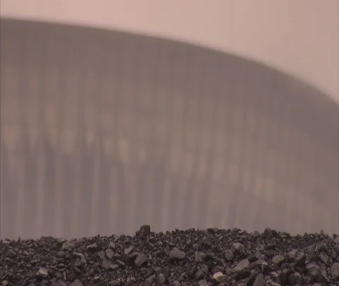 XCU Coal in foreground with processing plant in background Stock-Footage 86694092