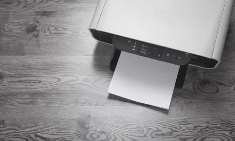 Xerox printer machine and papers on the desk. Stock Photos