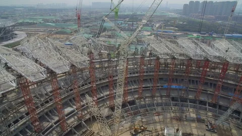 XI'AN, CHINA - MARCH 25, 2019: AERIAL shot of stadium being built,China Stock Footage 120582786
