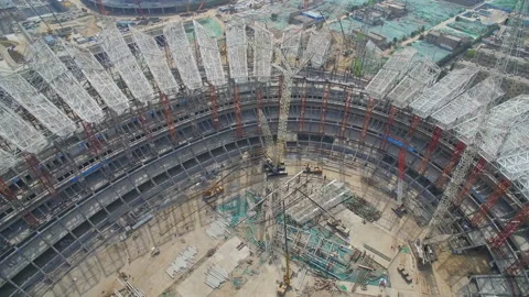 XI'AN, CHINA - MARCH 25, 2019: AERIAL shot of stadium being built,China Stock Footage 120710664