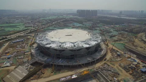 XI'AN, CHINA - MARCH 25, 2019: AERIAL shot of stadium being built,China Stock Footage 123756433
