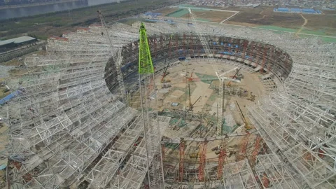 XI'AN, CHINA - MARCH 25, 2019: AERIAL shot of stadium being built,China Stock Footage 143773286