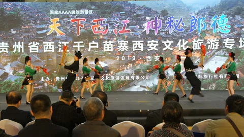 XI'AN, CHINA - MARCH 30, 2019: View of performers perform Miao nationality Stock Footage 211942553