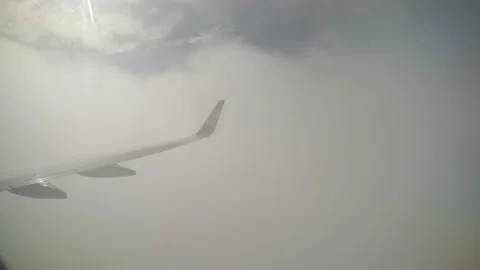 XI'AN, CHINA - MAY 17, 2018: Airplan wing through cloud.,China. Stock Footage 121292226