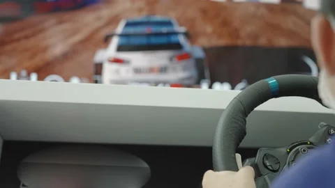 XI'AN, CHINA - OCT 01, 2021: Boys experience virtual driving.China,Xi'an. Stock Footage 211905160