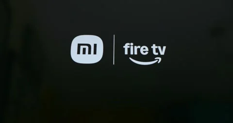 Xiaomi Fire TV smart television interface branding on screen Stock Footage 332826258