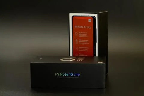 Xiaomi mi note 10 lite new phone box, on dark background Stock Photos
