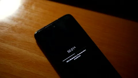 Xiaomi phone displaying update text message. Stock Footage 157677215