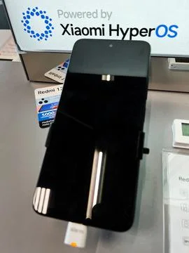 Xiaomi Redmi Smartphone Featuring HyperOS Technology Foto stock