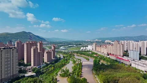 XINING, 12th, 2025: Drone shot of  central residential neighborhood of Xining, Stock Footage 325119296