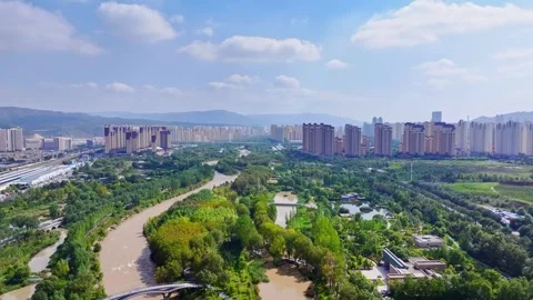 XINING, 12th, 2025: Drone shot of  central residential neighborhood of Xining, Stock Footage 325120295