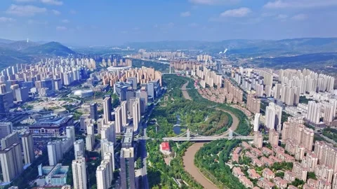 XINING, 12th, 2025: Drone shot of  central residential neighborhood of Xining, Stock Footage 325122626