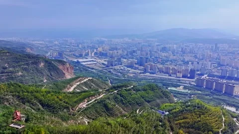 XINING, 12th, 2025: Drone shot of  central residential neighborhood of Xining, Stock-Footage 325123411