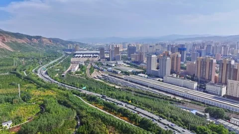 XINING, 12th, 2025: Drone shot of  central residential neighborhood of Xining, Stock Footage 325127928