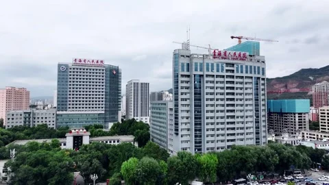 XINING, 12th, 2025: Drone shot of  central residential neighborhood of Xining, Stock Footage 325132984