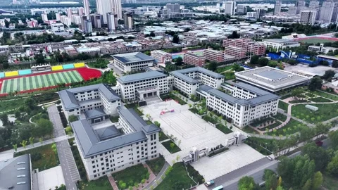 XINING, 12th, 2025: Drone shot of  central residential neighborhood of Xining, Stock Footage 325134631