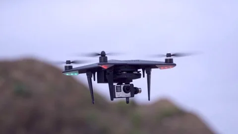 XiroDrone flys above the trees Stock Footage 69730485