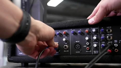 XLR Cable to Audio Mixer in Studio Inside Lightning Stock Footage 310139238