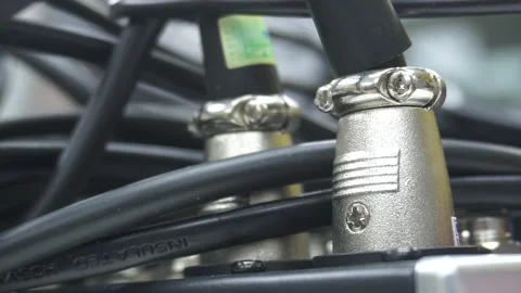 XLR connector microphone plug and insulated cable wire close up view indoor Video stock 254461746