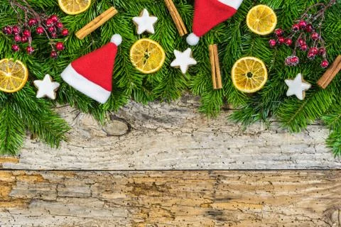 Xmas background with traditional elements on rustic wood with copy space Stock Photos