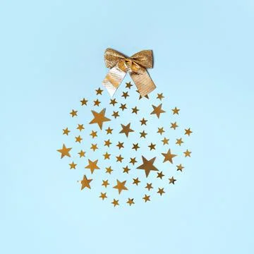 Xmas ball made of different small stars and a bow. Minimalistic Christmas Stock Photos