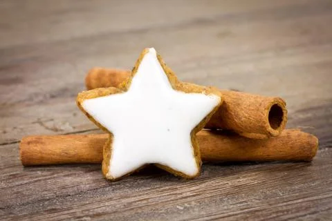Xmas cookie and cinnamon Stock Photos