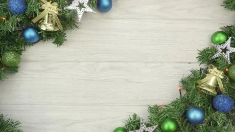 Xmas fir branch lights and decor on a wooden background Stock Footage