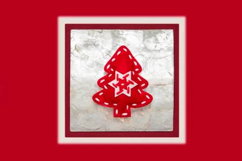 Xmas minimal flat lay composition with handmade red felt Christmas tree decor Stock Photos