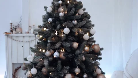 Xmas tree decorations background. Many large golden balls on fir tree New Year Video stock 145285397