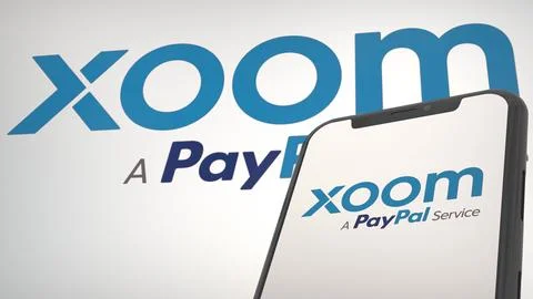Xoom app logo in mobile display screen and background editorial Stock-Fotos