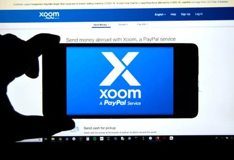 Xoom mobile application and logo. It is a PayPal service of electronic funds  Fotos Stock