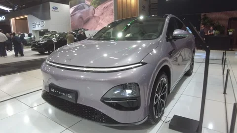 Xpeng g6 awd performance black edition makes premiere 2026 brussels motor show Stock Footage 328207928