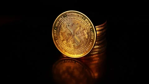 XRP Cryptocurrency Coin Emerging from Darkness Stock Footage 339568902