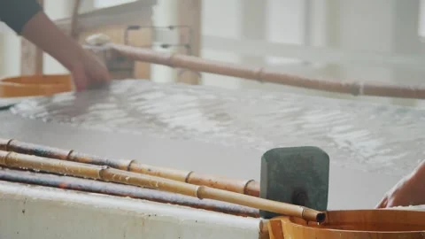 Xuan Paper Making - Hand Pounding the Pulp 4K Stock Footage 339083986
