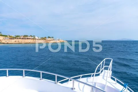 The yacht on the background of picturesque view Stock Photos