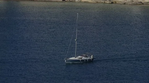 Yacht in blue ocean Stock Footage 74577223