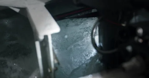 Yacht engine testing at night. The propeller creates bubbling water. 動画素材 269880238