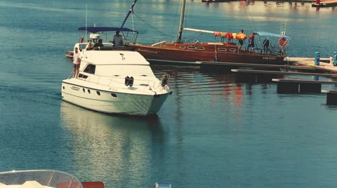 Yacht floating in the harbor Stock Footage 54077129