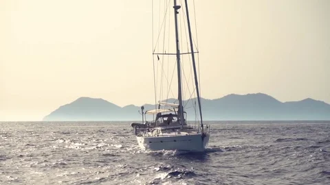 Yacht floating in the sea Stock Footage 80509363